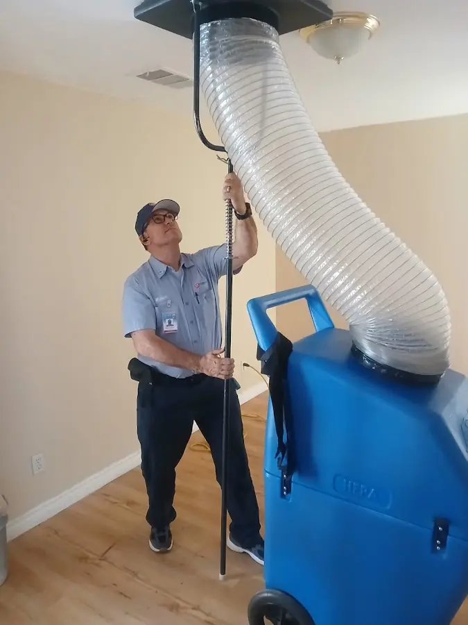HVAC Installation technician using HEPA equipment in Thatcher